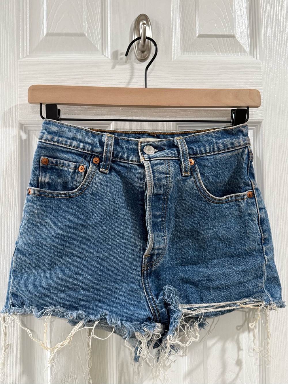 Levi's Distressed Medium Blue Denim Cutoff Shorts